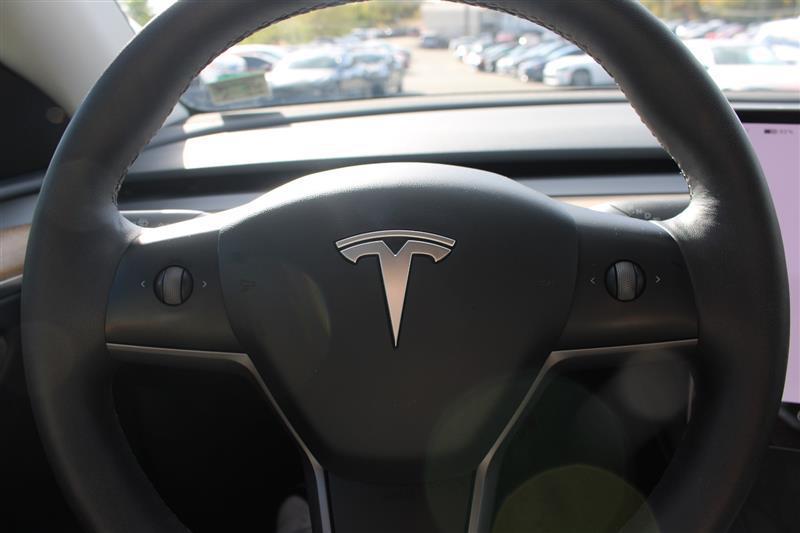 used 2024 Tesla Model Y car, priced at $27,999