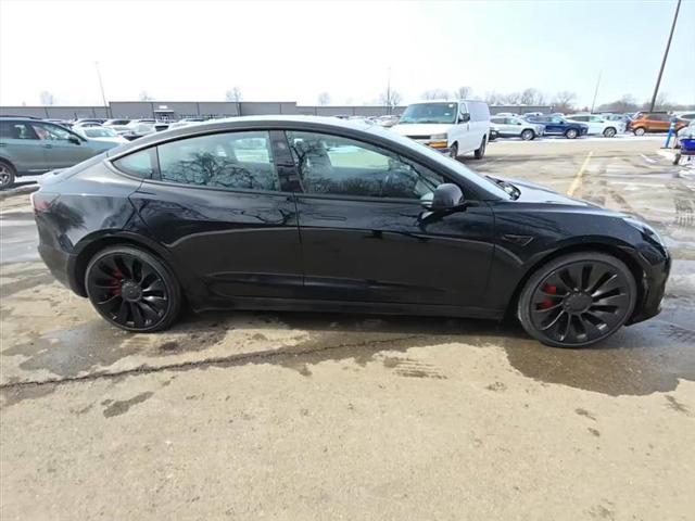 used 2023 Tesla Model 3 car, priced at $20,450