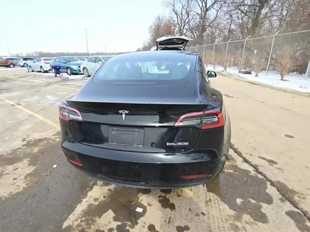 used 2023 Tesla Model 3 car, priced at $20,450