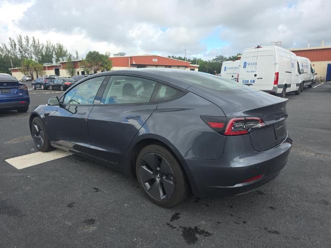 used 2023 Tesla Model 3 car, priced at $18,999