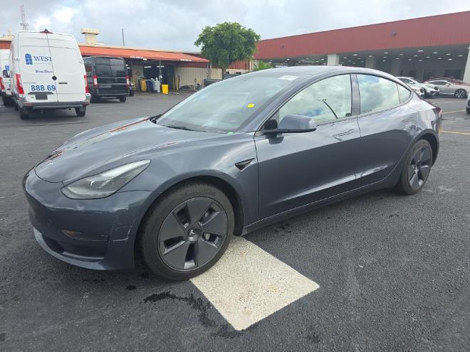 used 2023 Tesla Model 3 car, priced at $18,999