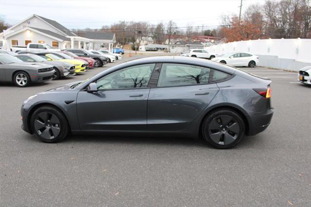 used 2022 Tesla Model 3 car, priced at $25,750