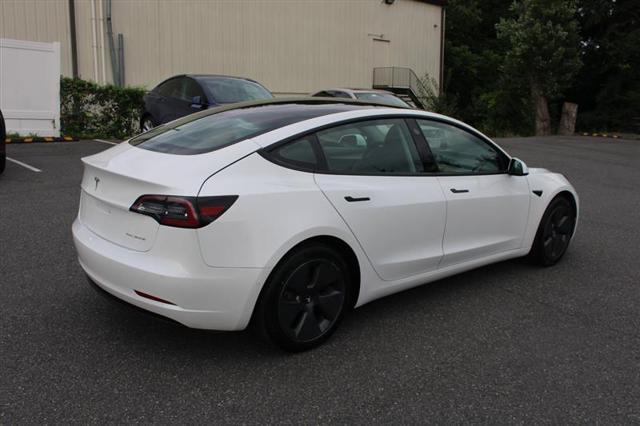 used 2022 Tesla Model 3 car, priced at $19,999