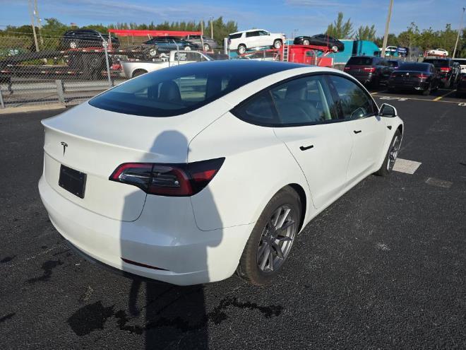 used 2023 Tesla Model 3 car, priced at $19,999