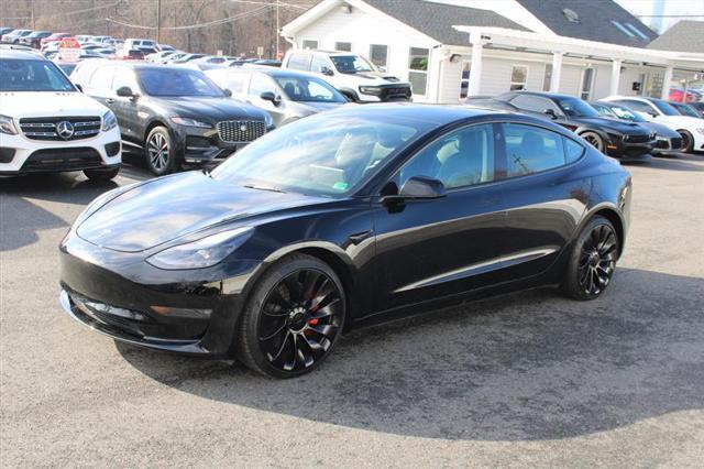 used 2022 Tesla Model 3 car, priced at $27,450