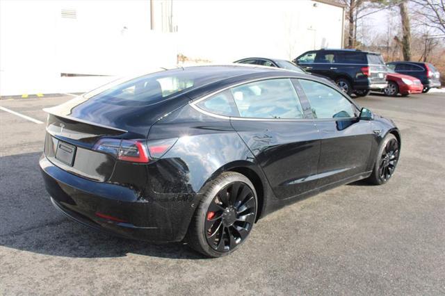 used 2022 Tesla Model 3 car, priced at $27,450