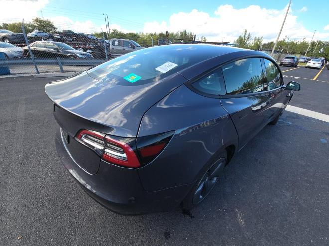 used 2023 Tesla Model 3 car, priced at $18,999