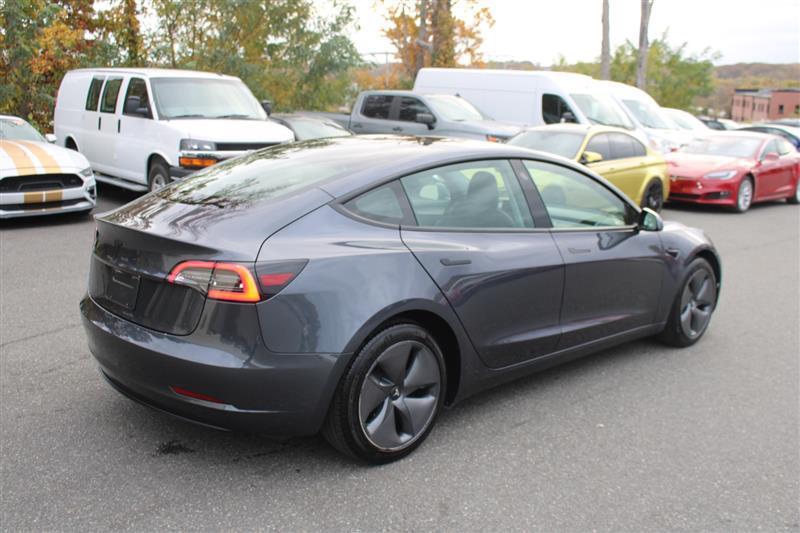 used 2023 Tesla Model 3 car, priced at $18,999