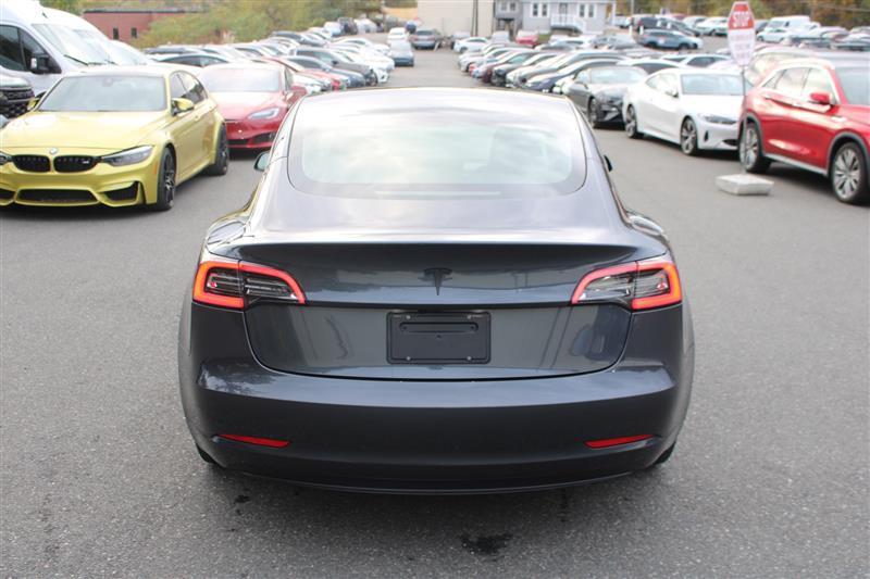 used 2023 Tesla Model 3 car, priced at $18,999