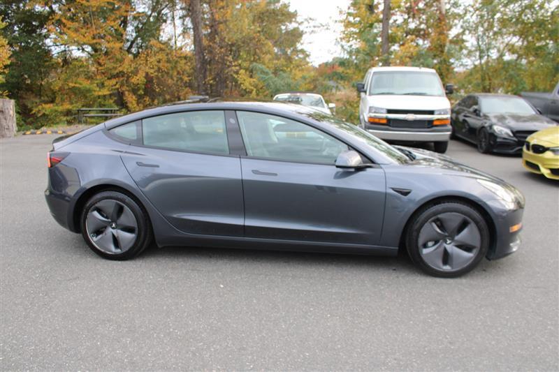 used 2023 Tesla Model 3 car, priced at $18,999