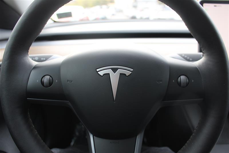 used 2023 Tesla Model 3 car, priced at $18,999