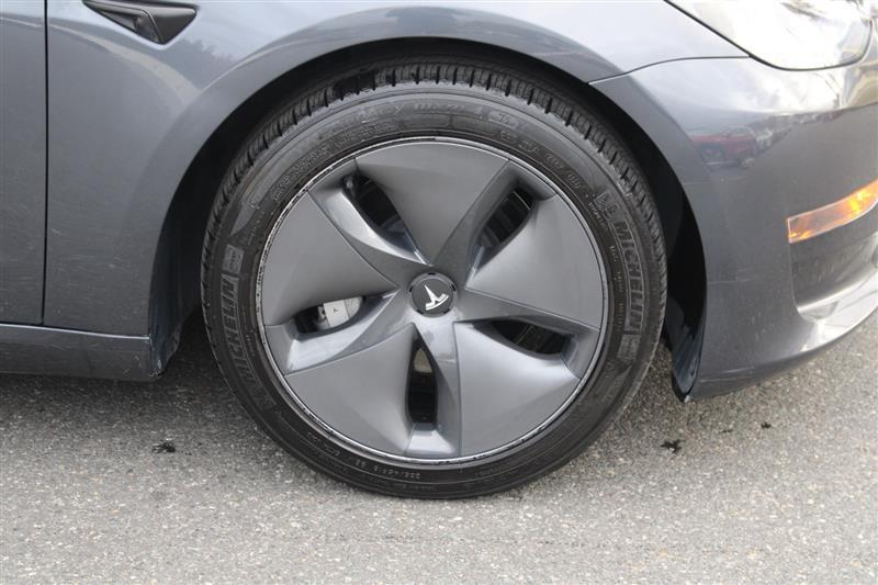 used 2023 Tesla Model 3 car, priced at $18,999