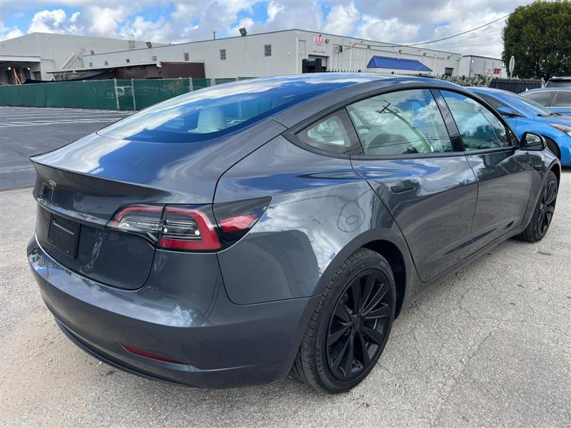 used 2023 Tesla Model 3 car, priced at $20,450