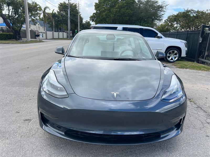 used 2023 Tesla Model 3 car, priced at $20,450