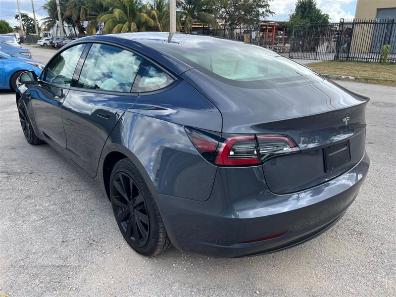 used 2023 Tesla Model 3 car, priced at $20,450