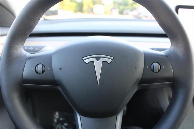used 2022 Tesla Model 3 car, priced at $21,999
