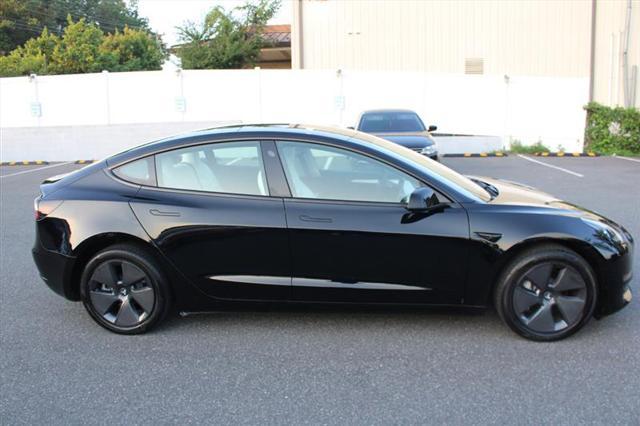used 2023 Tesla Model 3 car, priced at $24,999