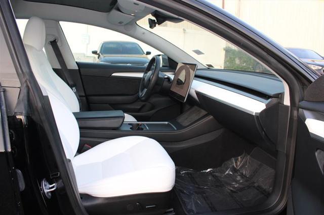 used 2023 Tesla Model 3 car, priced at $24,999