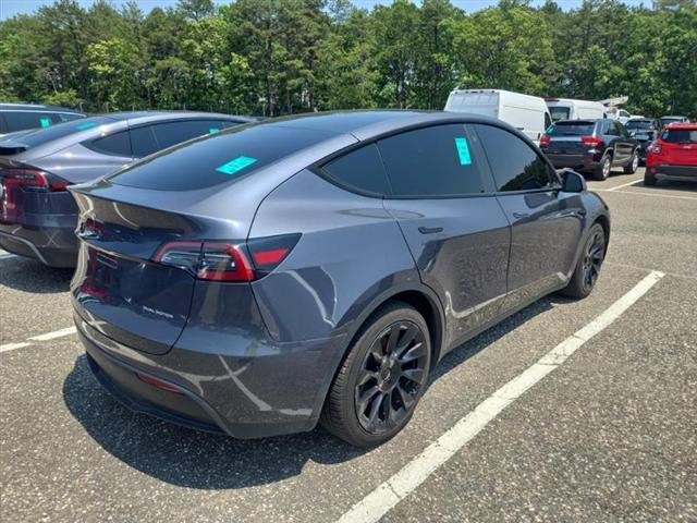 used 2023 Tesla Model Y car, priced at $22,999