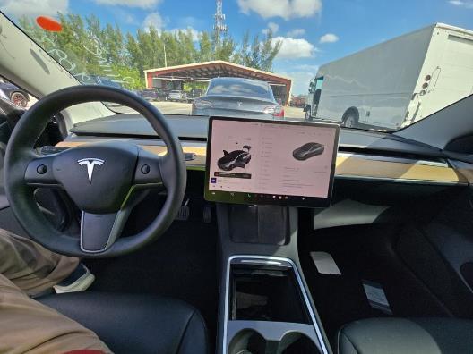 used 2023 Tesla Model 3 car, priced at $25,999