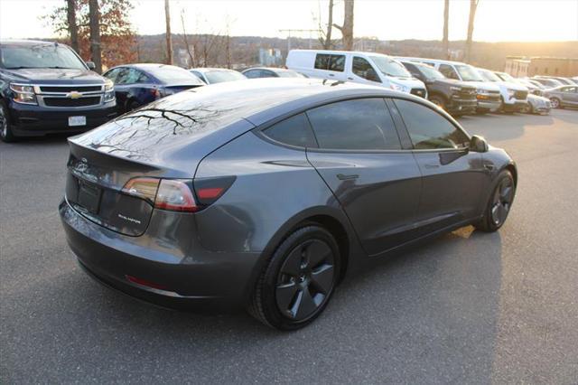 used 2023 Tesla Model 3 car, priced at $25,999