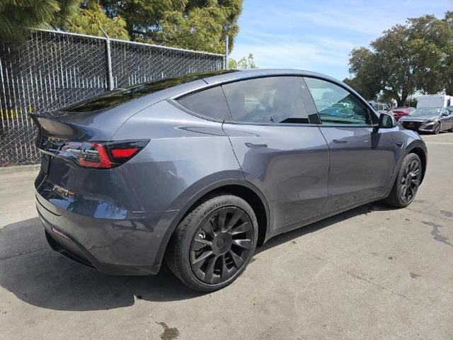 used 2022 Tesla Model Y car, priced at $22,999