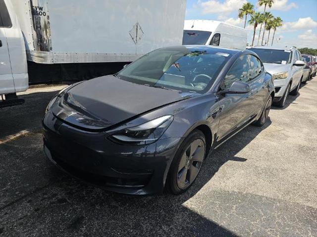 used 2023 Tesla Model 3 car, priced at $21,999