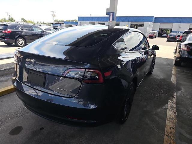 used 2023 Tesla Model 3 car, priced at $21,999