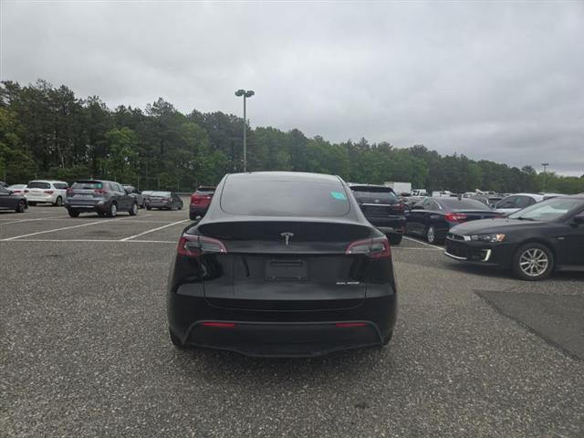 used 2023 Tesla Model Y car, priced at $24,450