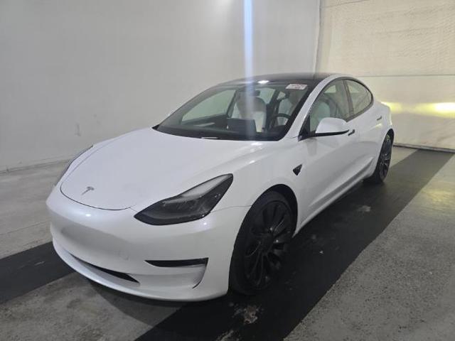 used 2022 Tesla Model 3 car, priced at $19,450