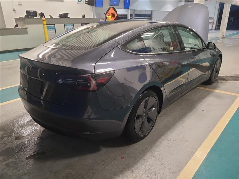 used 2023 Tesla Model 3 car, priced at $20,450