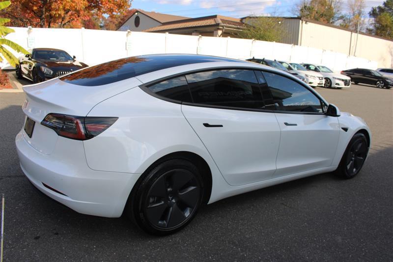 used 2023 Tesla Model 3 car, priced at $19,450