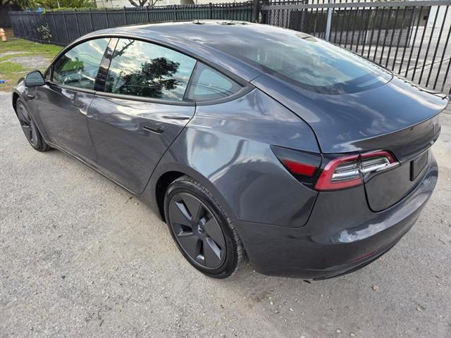 used 2023 Tesla Model 3 car, priced at $19,450