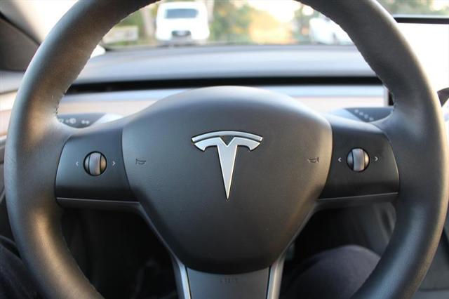 used 2022 Tesla Model 3 car, priced at $27,999