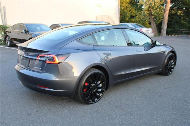 used 2022 Tesla Model 3 car, priced at $27,999