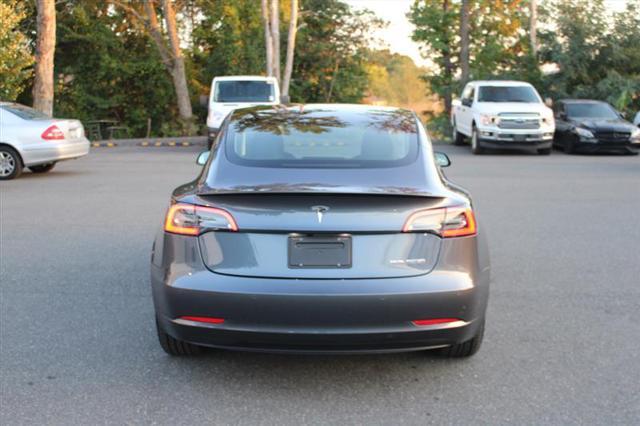 used 2022 Tesla Model 3 car, priced at $27,999