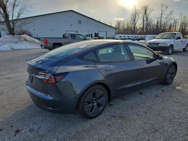 used 2023 Tesla Model 3 car, priced at $19,450