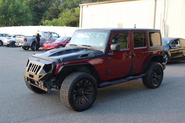 used 2012 Jeep Wrangler Unlimited car, priced at $13,999