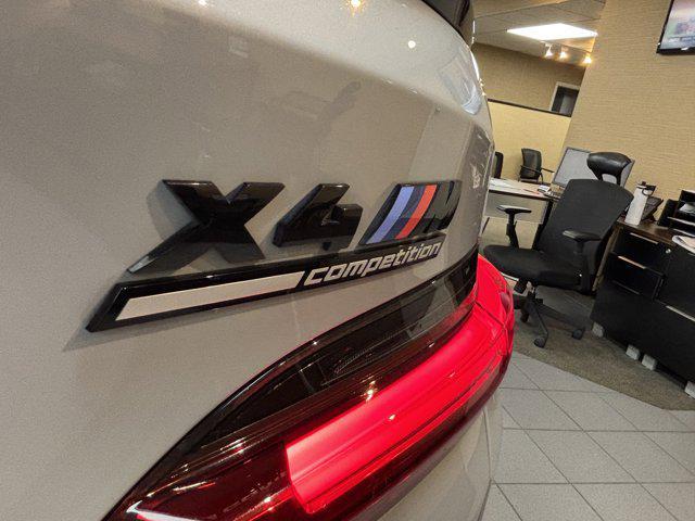 used 2022 BMW X4 M car, priced at $60,000