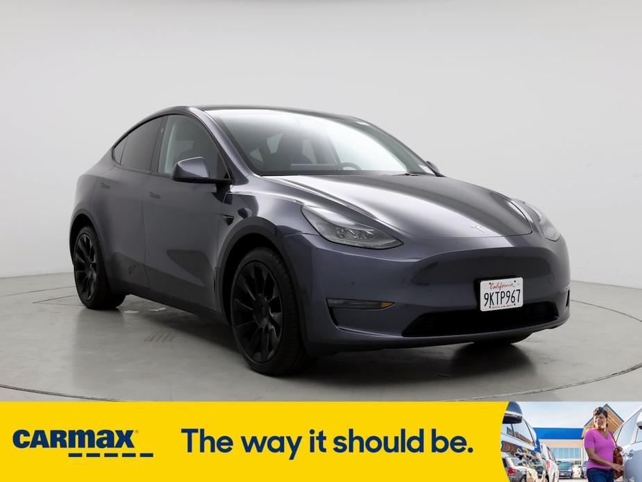 used 2024 Tesla Model Y car, priced at $43,998