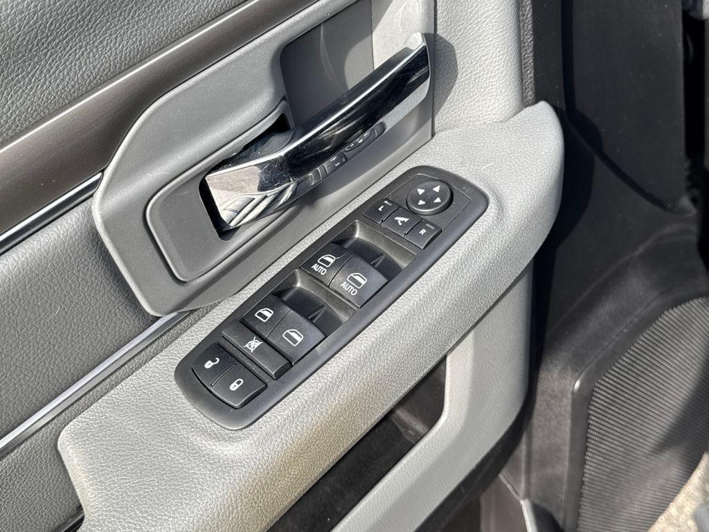 used 2018 Ram 1500 car, priced at $21,574