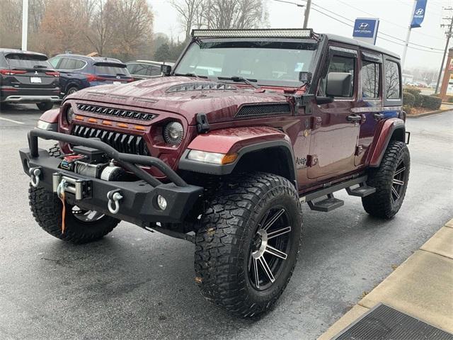 used 2021 Jeep Wrangler Unlimited car, priced at $36,495