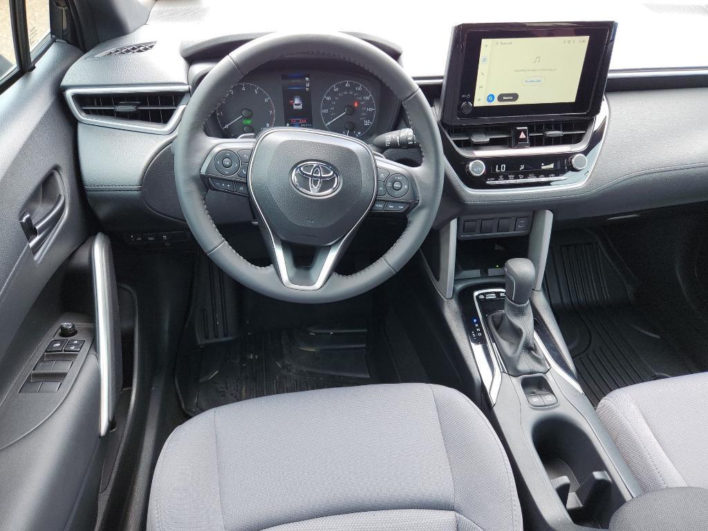 used 2024 Toyota Corolla Cross Hybrid car, priced at $27,224