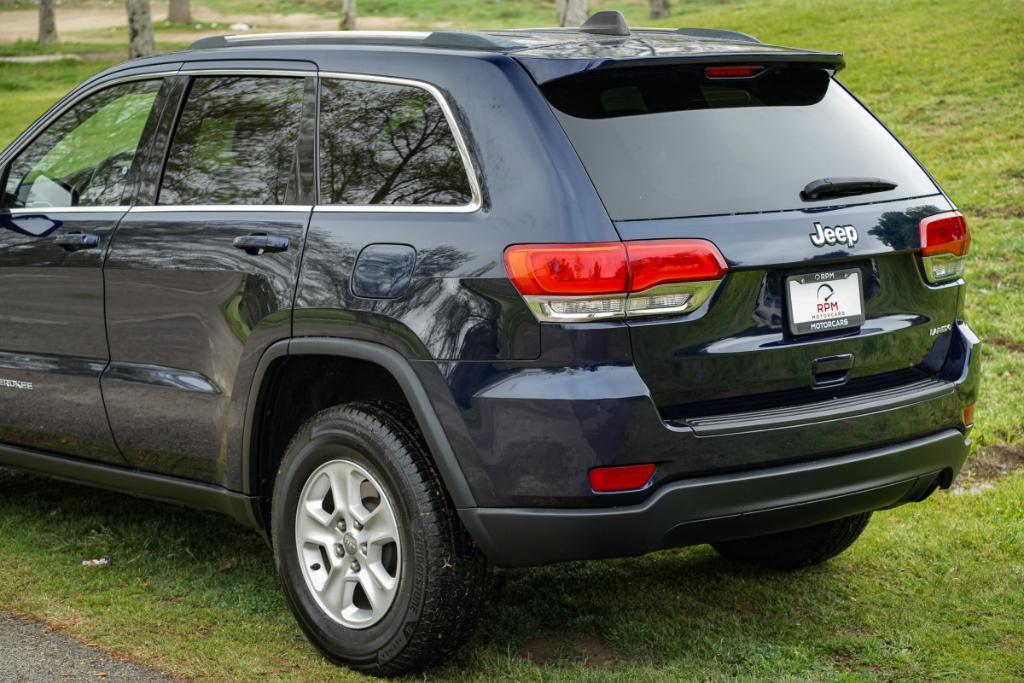 used 2015 Jeep Grand Cherokee car, priced at $13,980