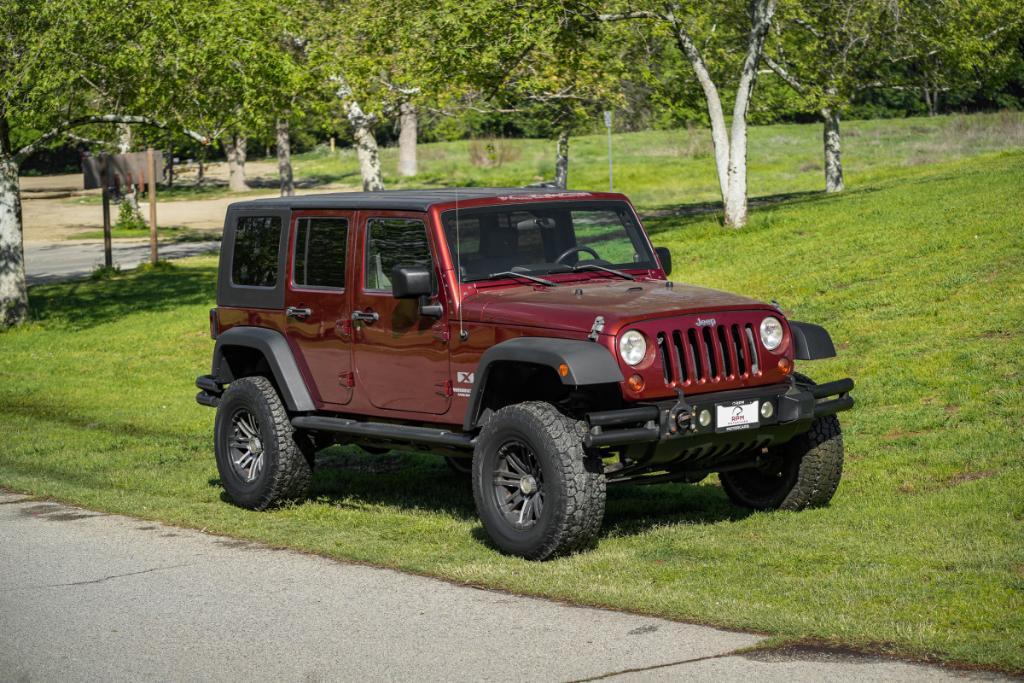 used 2009 Jeep Wrangler Unlimited car, priced at $13,980