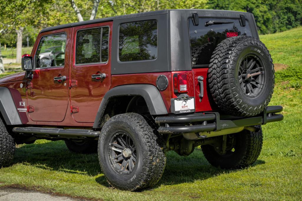used 2009 Jeep Wrangler Unlimited car, priced at $13,980