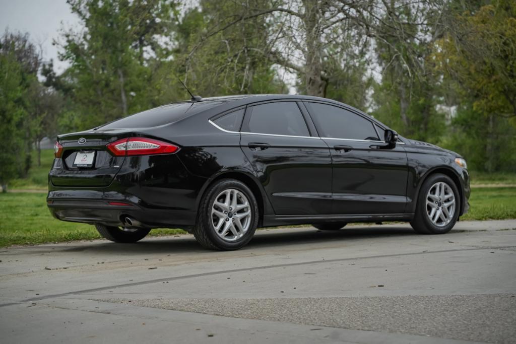 used 2016 Ford Fusion car, priced at $8,980
