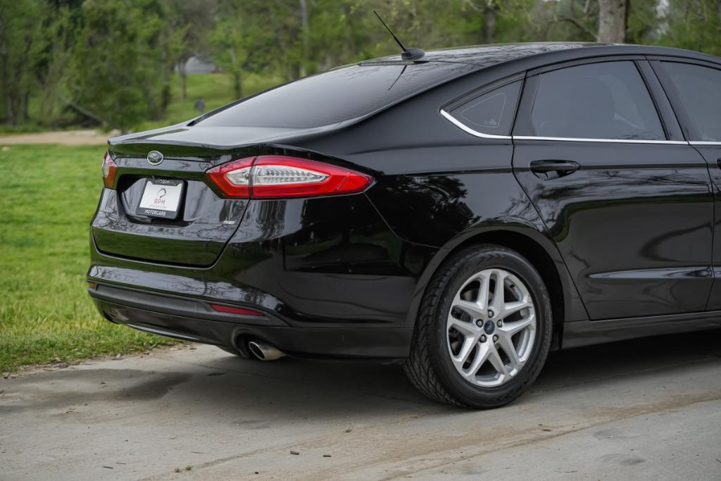 used 2016 Ford Fusion car, priced at $7,980