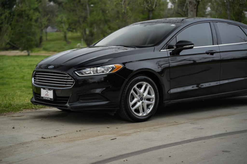 used 2016 Ford Fusion car, priced at $7,980