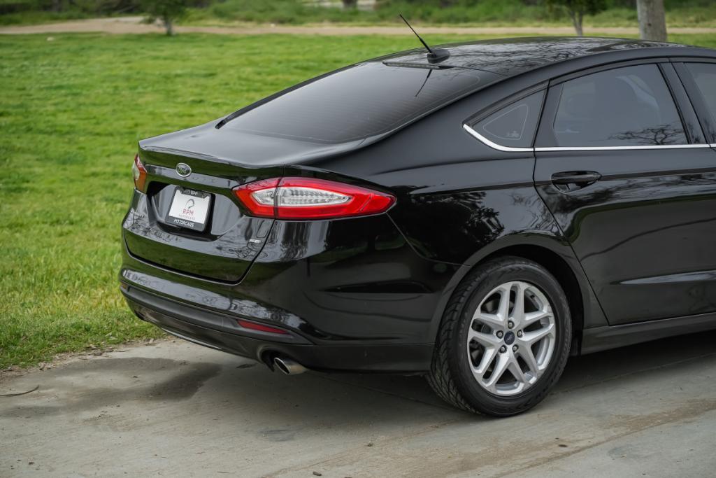 used 2016 Ford Fusion car, priced at $7,980